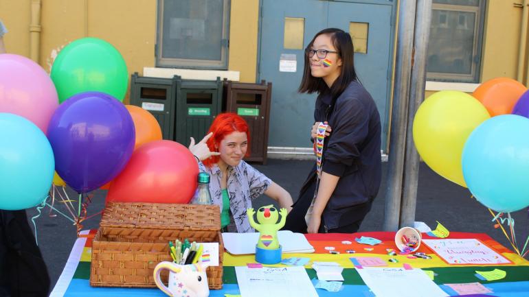 Students man a table for the GSA at Club Day