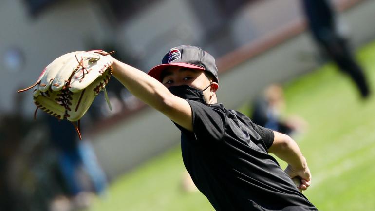 Student Playing Baseball