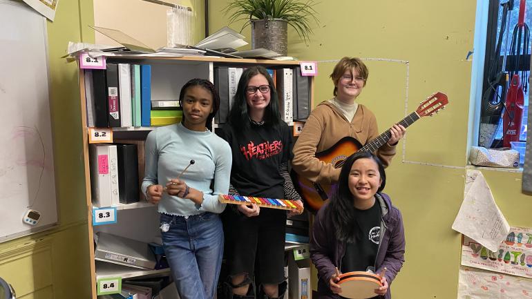 Club members pose with instruments
