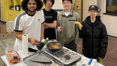 students cooking a meal