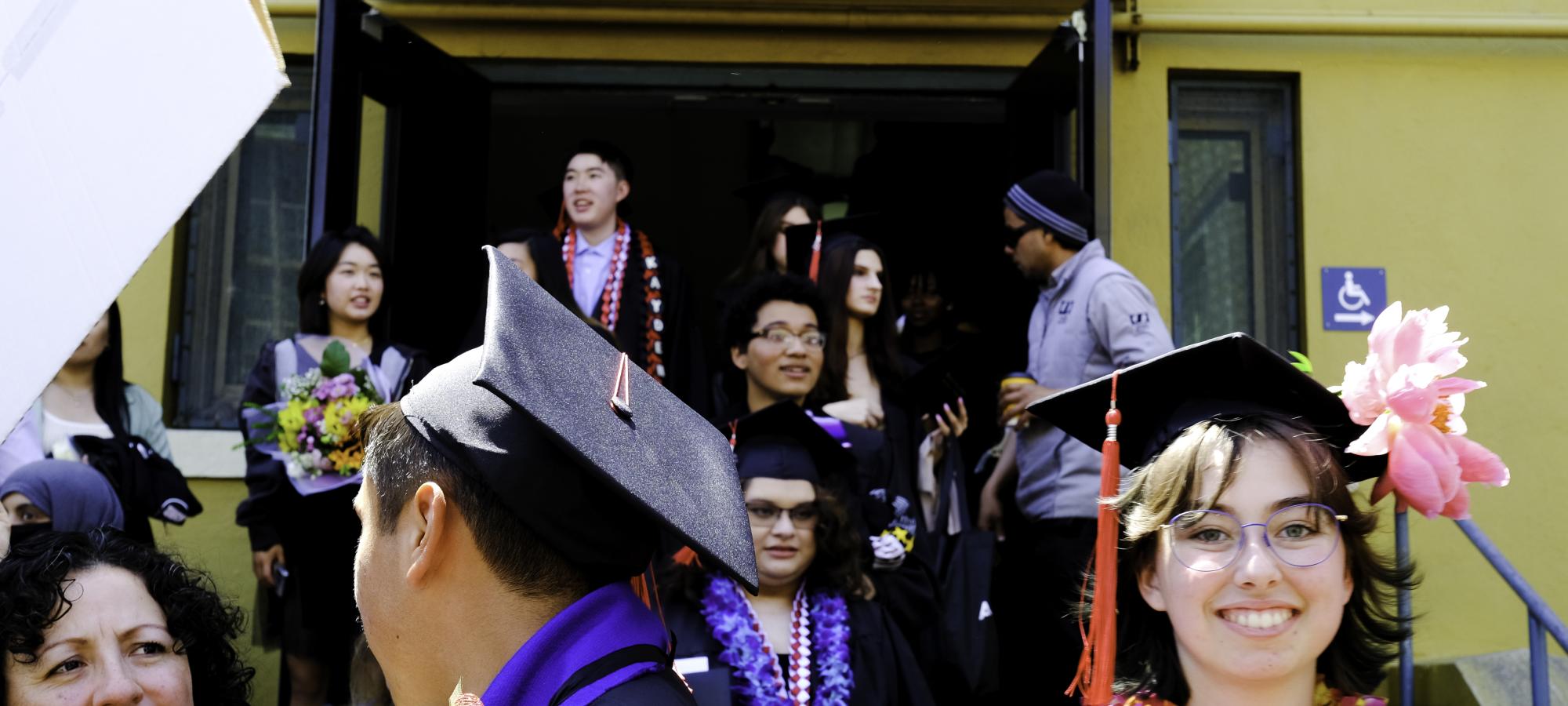 graduates exiting the ceremony