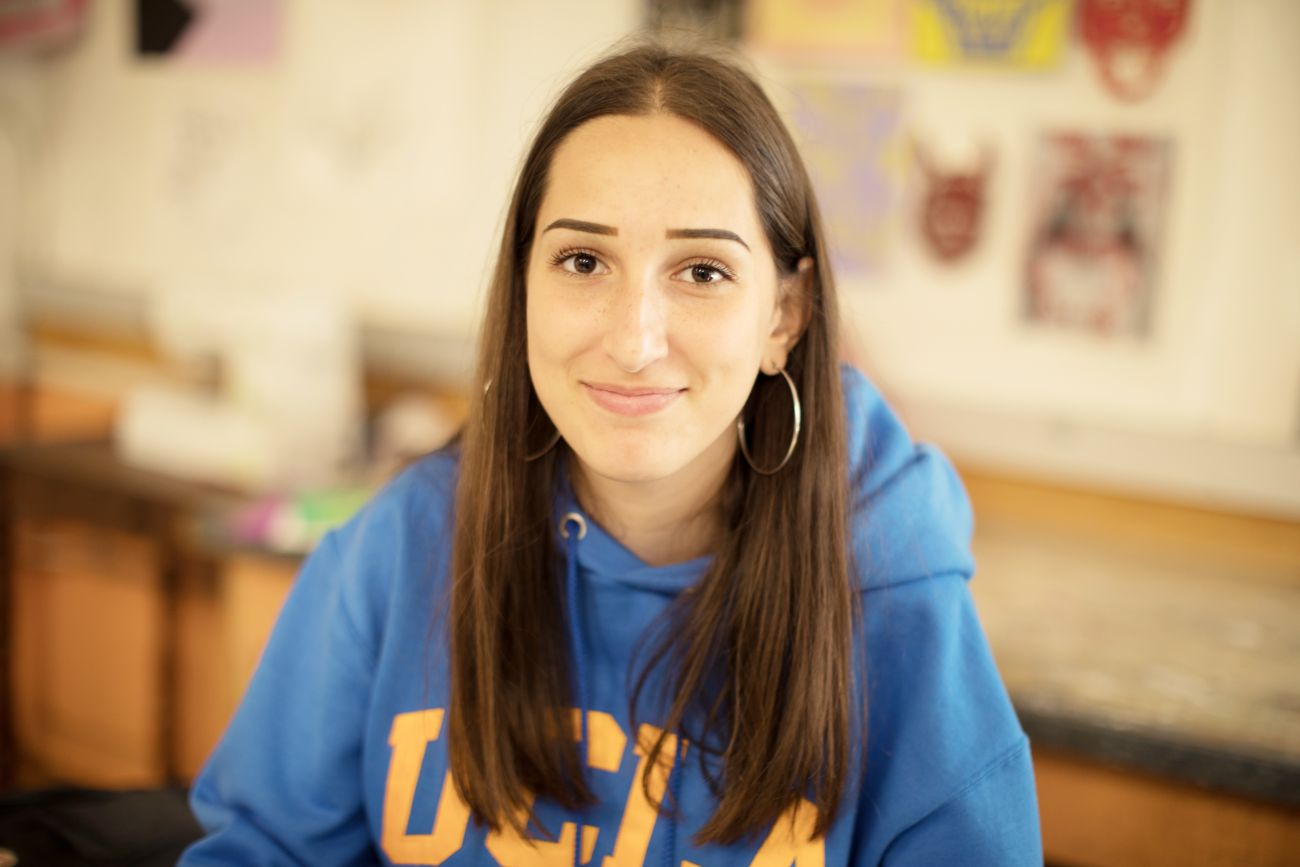 Female student smiling at camera